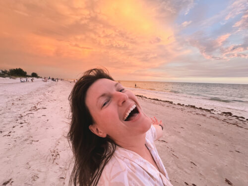 Erin, B2B SaaS content writing strategist, enjoying beach.